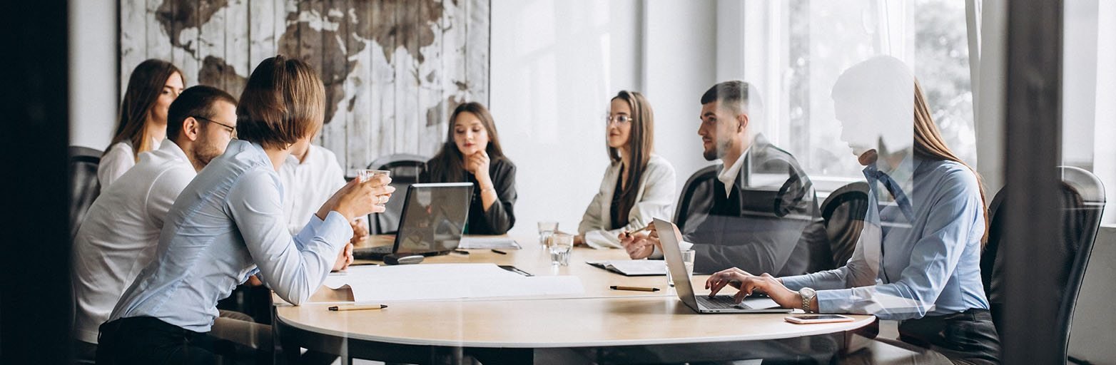 Group of people working out business plan in an office
